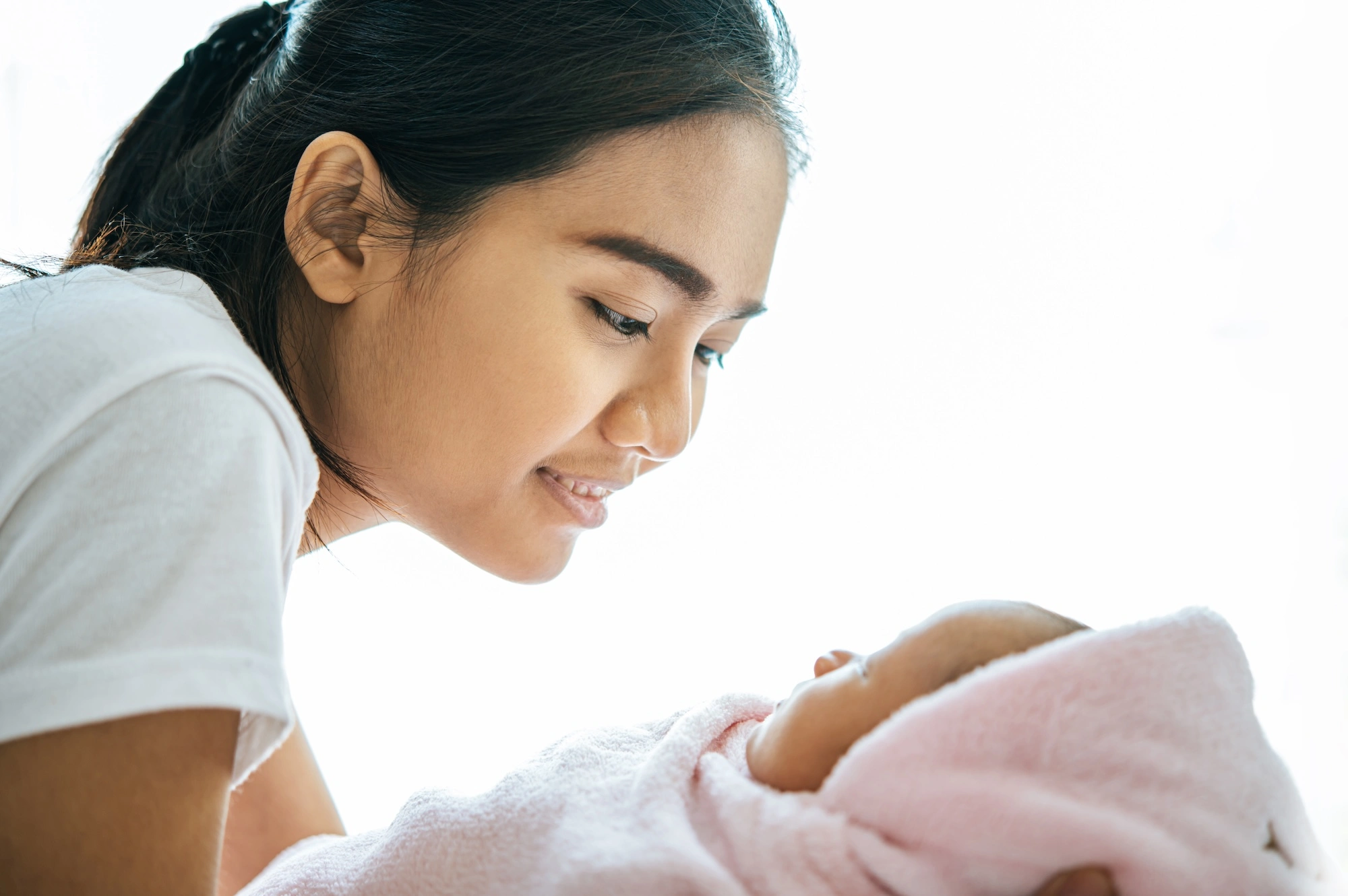 Myanmar maid Indonesian maid watching newborn baby care agency