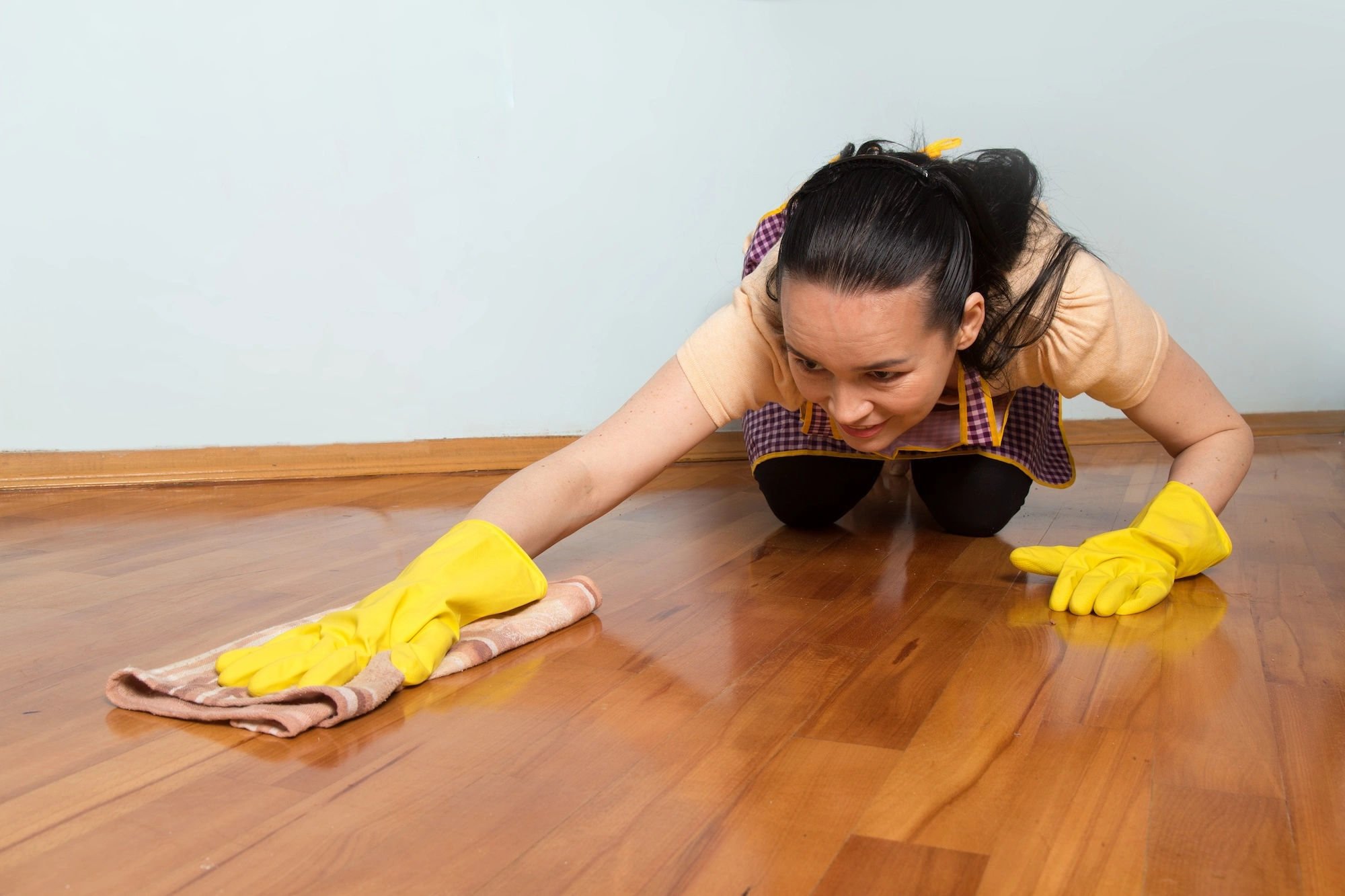 Myanmar maid Indonesian maid cleaning the floor maid agency in singapore